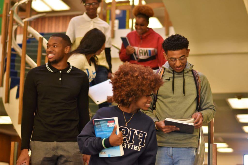 Students walking down stairs